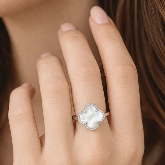 Minimal mother of pearl clover halo ring in 925 silver with crystal detailing, stylish everyday jewellery for modern women.