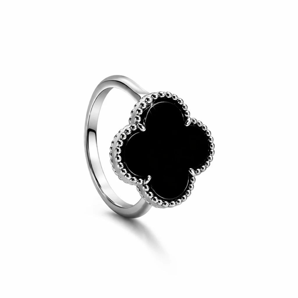 Black onyx clover ring in 925 sterling silver with a minimal elegant design, perfect for everyday wear.
