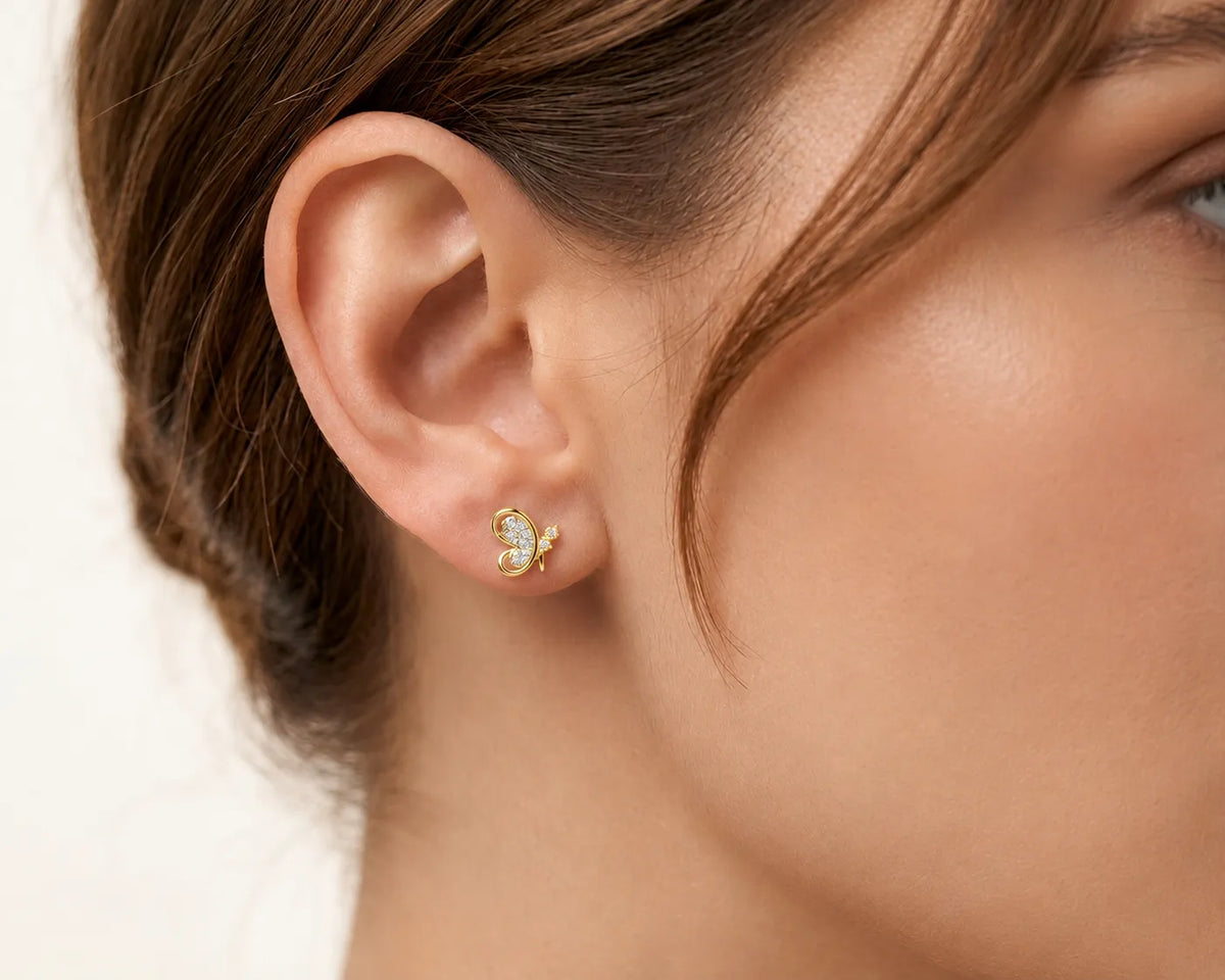 925 sterling silver butterfly swirl CZ stud earrings with sparkling detailing and elegant butterfly-inspired design