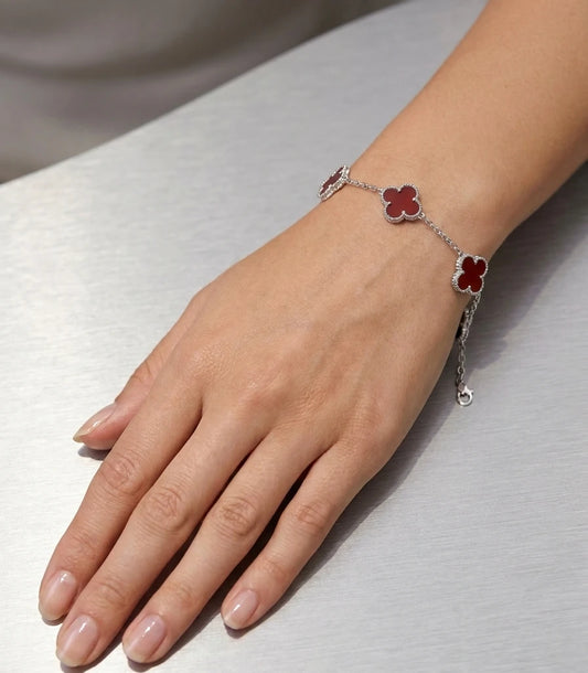 Red clover charm bracelet for women in 925 sterling silver, stylish minimal jewellery for everyday wear.