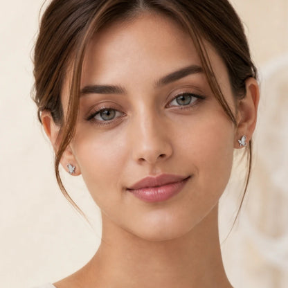 925 sterling silver butterfly swirl CZ stud earrings with sparkling detailing and elegant butterfly-inspired design