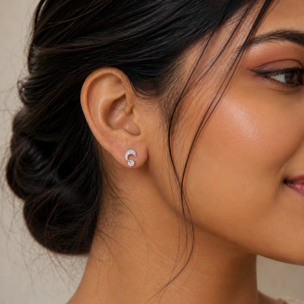 925 sterling silver crystal loop CZ stud earrings with sparkling detailing and round crystal accent